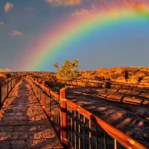 A rainbow over a bridge